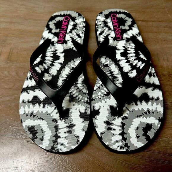 Calvin Klein black and white flip flops. - Picture 1 of 6